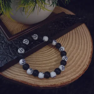 om white and black bracelet